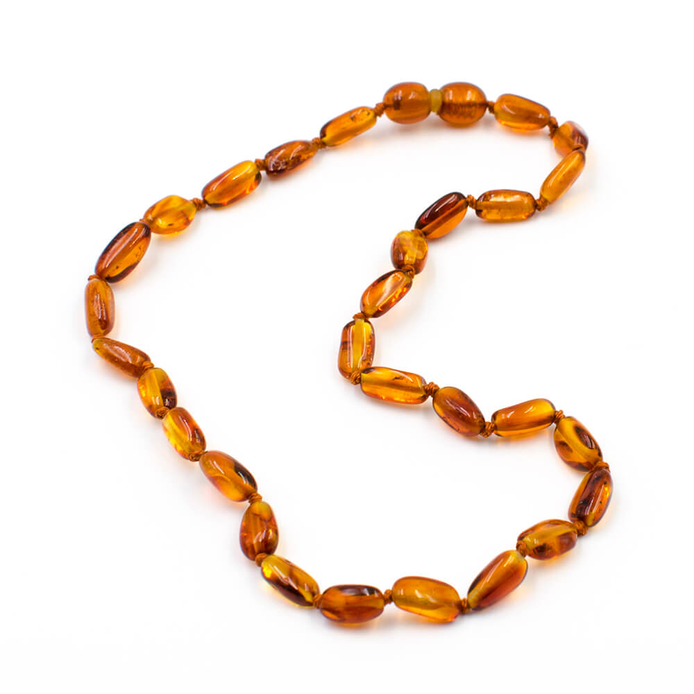Collier d'ambre pour bébé perles olivettes couleur caramel